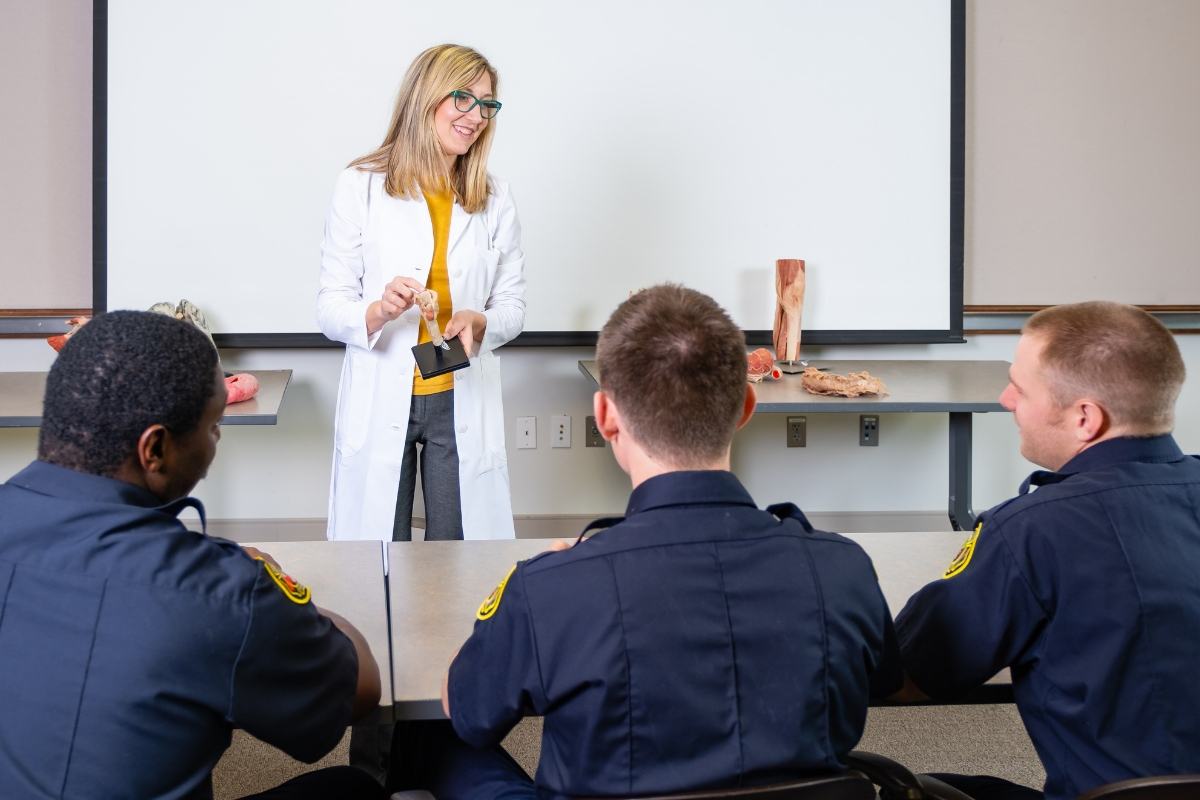 Jamie Decker provides anatomy training to First Responders in uniform